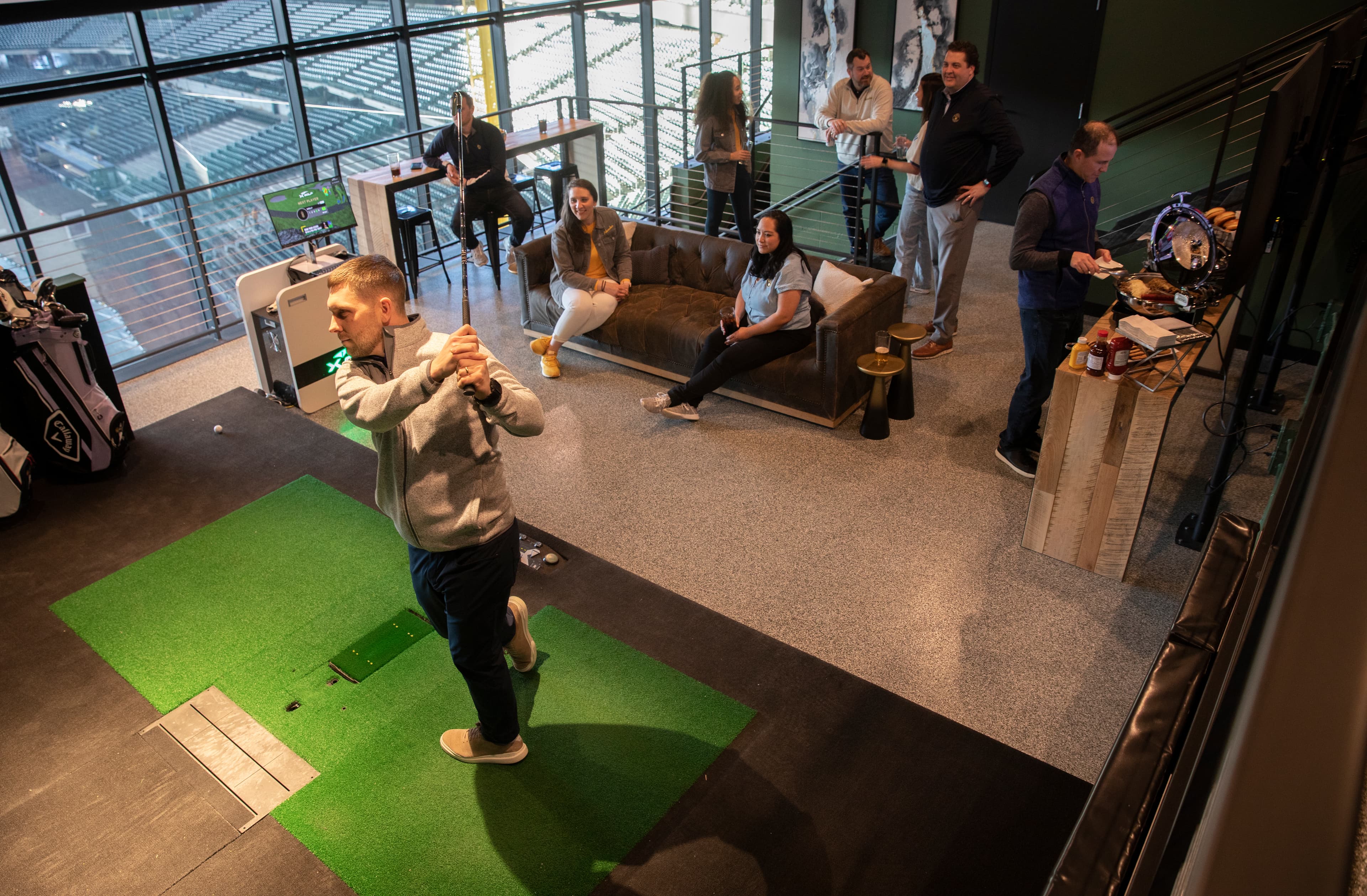 X-Golf at American Family Field | Year-Round Golf Simulator Suites & Events - Image 4