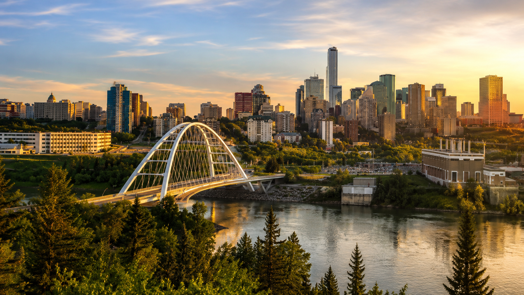 Edmonton skyline at golden hour with Walterdale Bridge, North Saskatchewan River, downtown towers and river valley views in Alberta.