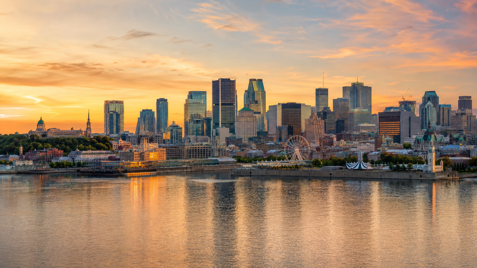 Montreal skyline at golden hour with downtown towers, Old Port, La Grande Roue and the St. Lawrence River in Quebec, Canada.