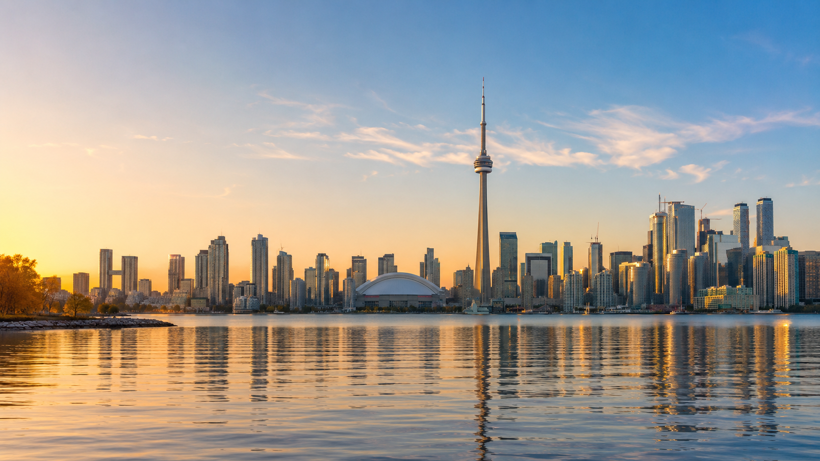 Ontario marketplace hero image showing the Toronto skyline at golden hour with the CN Tower, Rogers Centre and Lake Ontario reflections.
