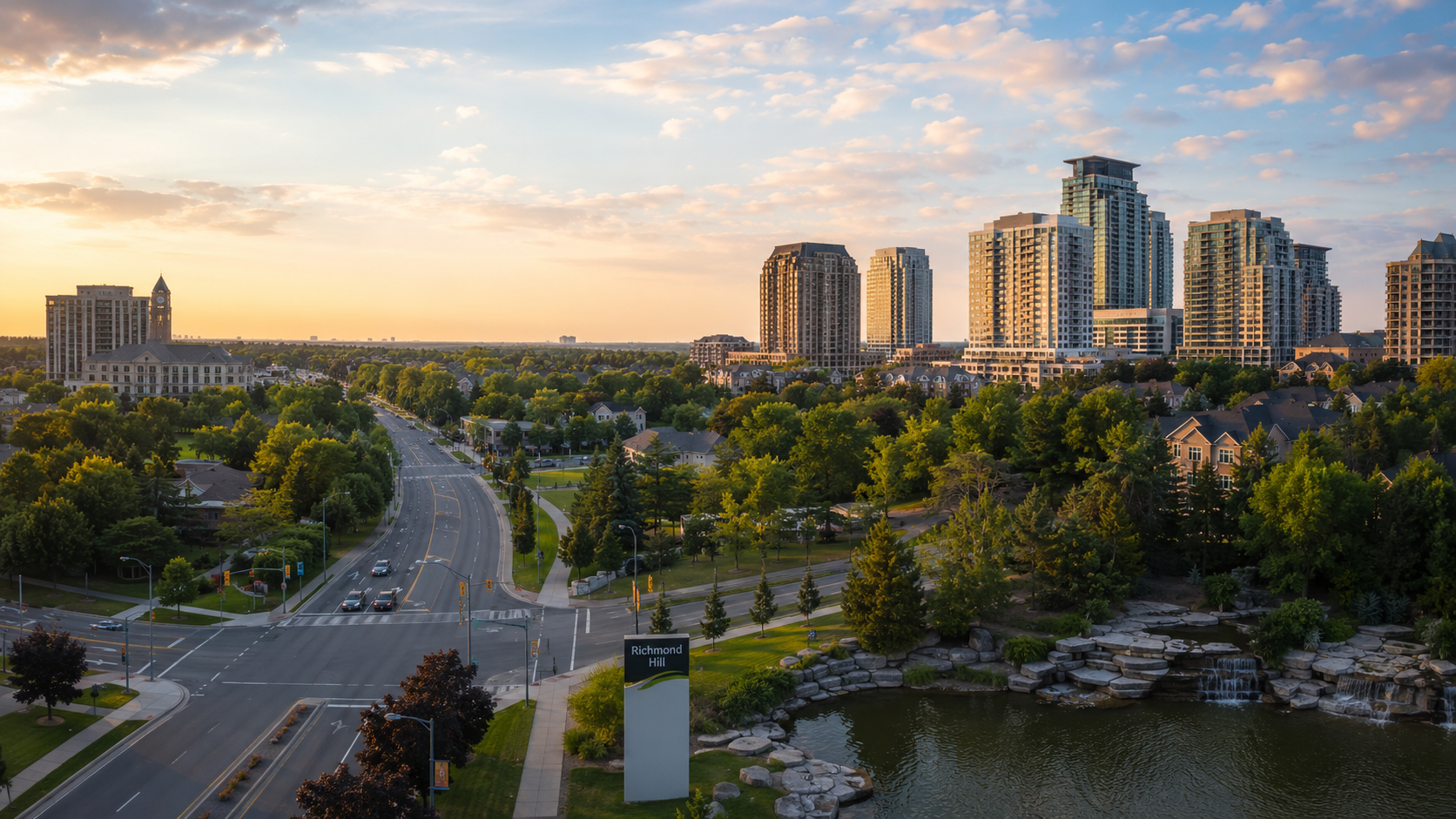 Richmond Hill skyline at golden hour with high-rises, tree-lined streets, city roads and green park space in Ontario, Canada.