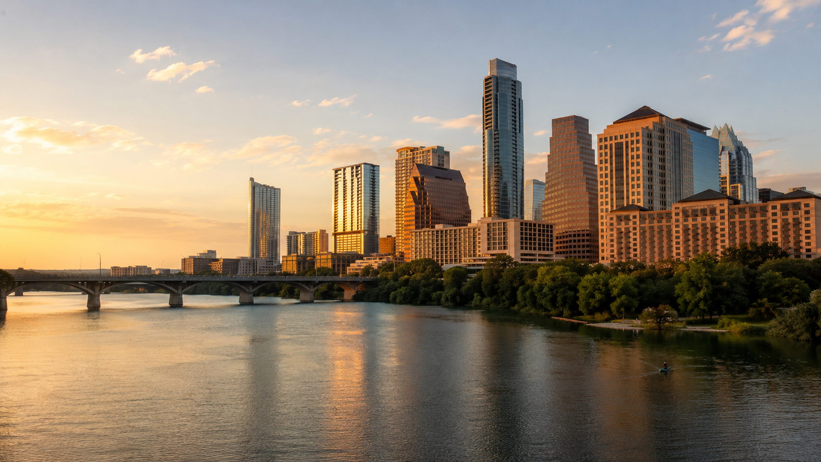 Austin-inspired Texas skyline at golden hour with Lady Bird Lake, downtown high-rises, bridge reflections and kayakers.